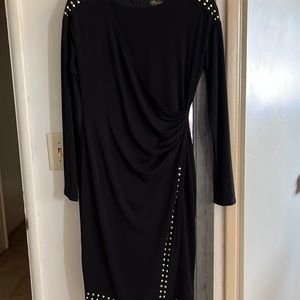 Thalia Sodi size small.. black with gold trim; heavy material